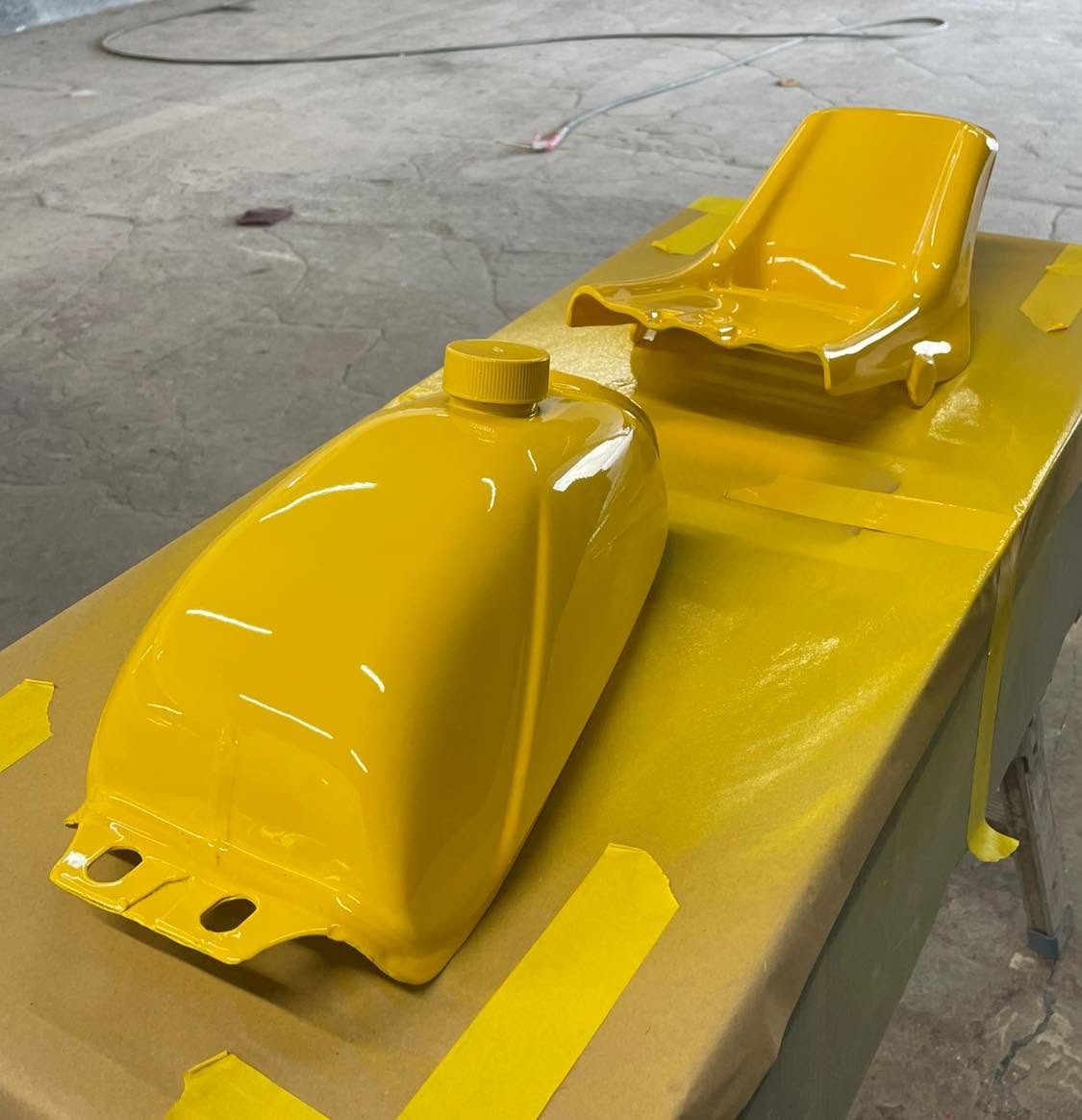 Bright yellow plastic fuel tank and seat component